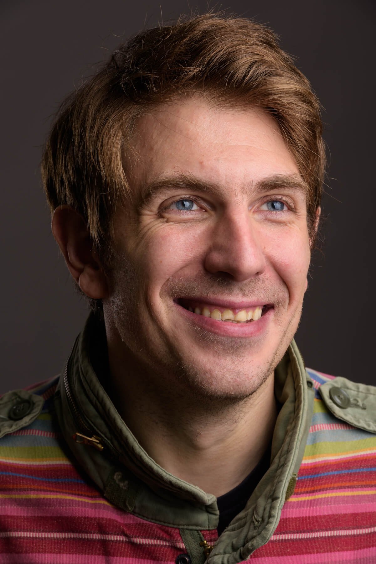 portrait of handsome man against gray background 2025 01 29 02 56 19 utc